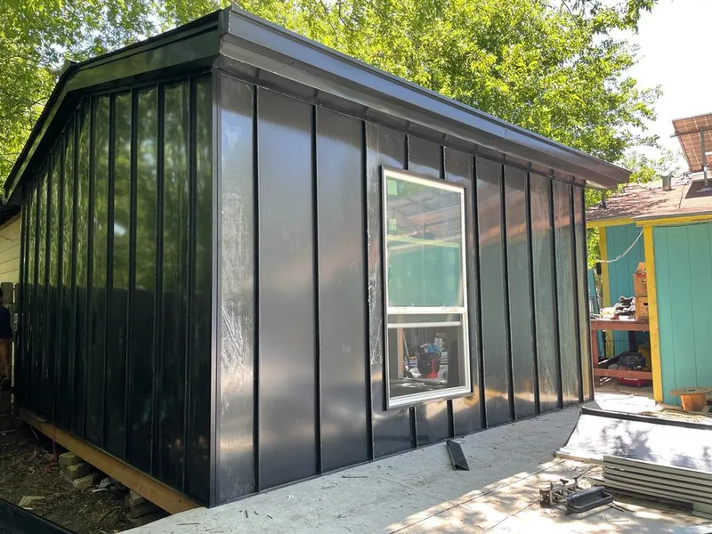 Black standing seam metal wall panels for Metal Roof Installation in Holly Springs